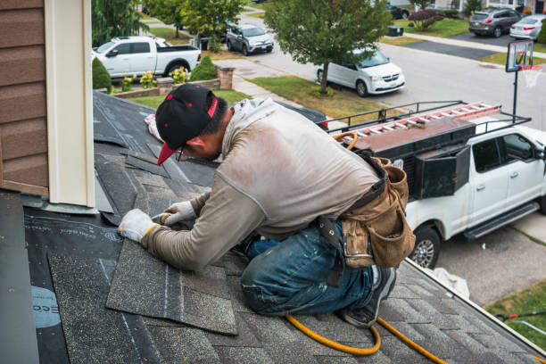 Professional Roofing technician working in Lowell, MI